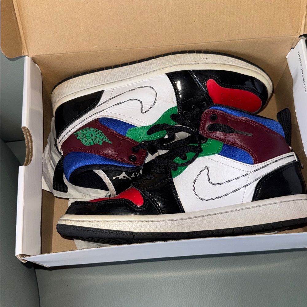 Women’s Air Jordan, one mid SE black white university red
